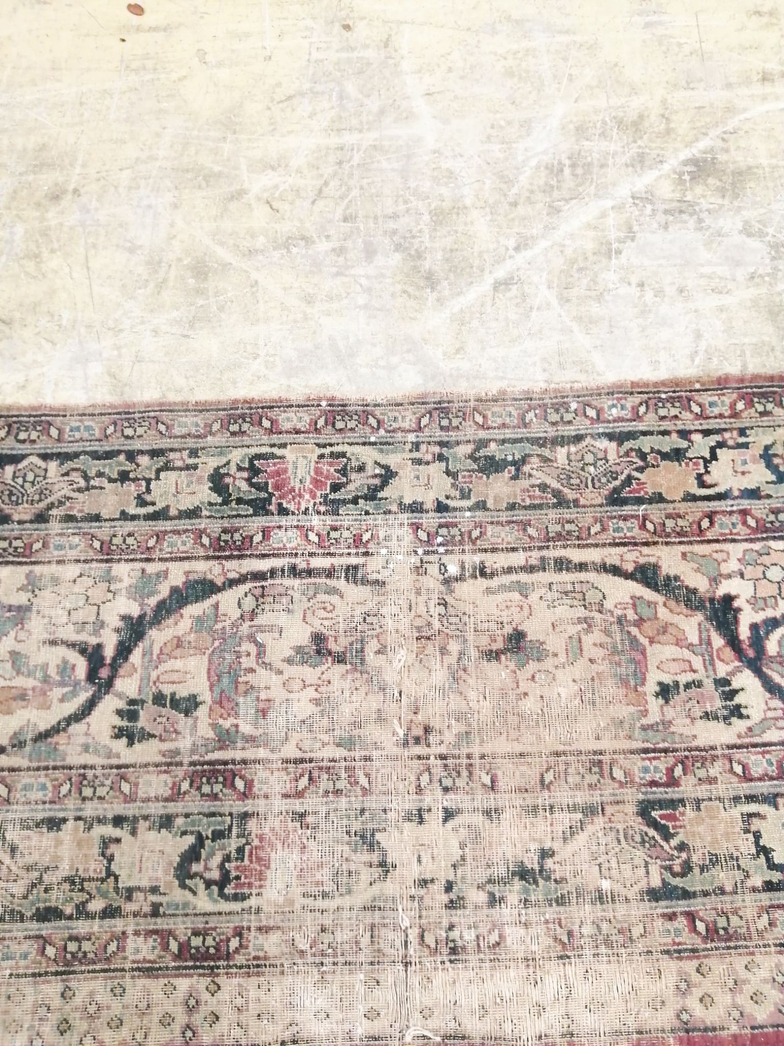 An antique Kashan blue ground carpet (worn and holed) 410 x 300cm